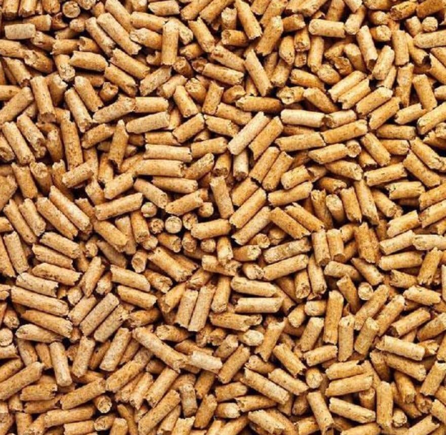 Close-up of high-density biomass pellets, a clean renewable fuel made from agricultural residue and forest biomass